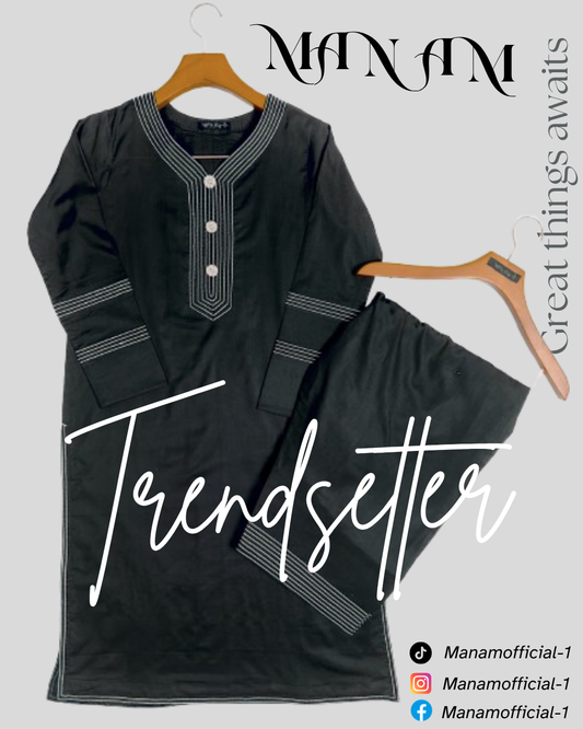 showing classy Black two pieces outfit with silver buttons and thread work along with farshi shalwar on a hanger, featuring the brand 'Manam'.