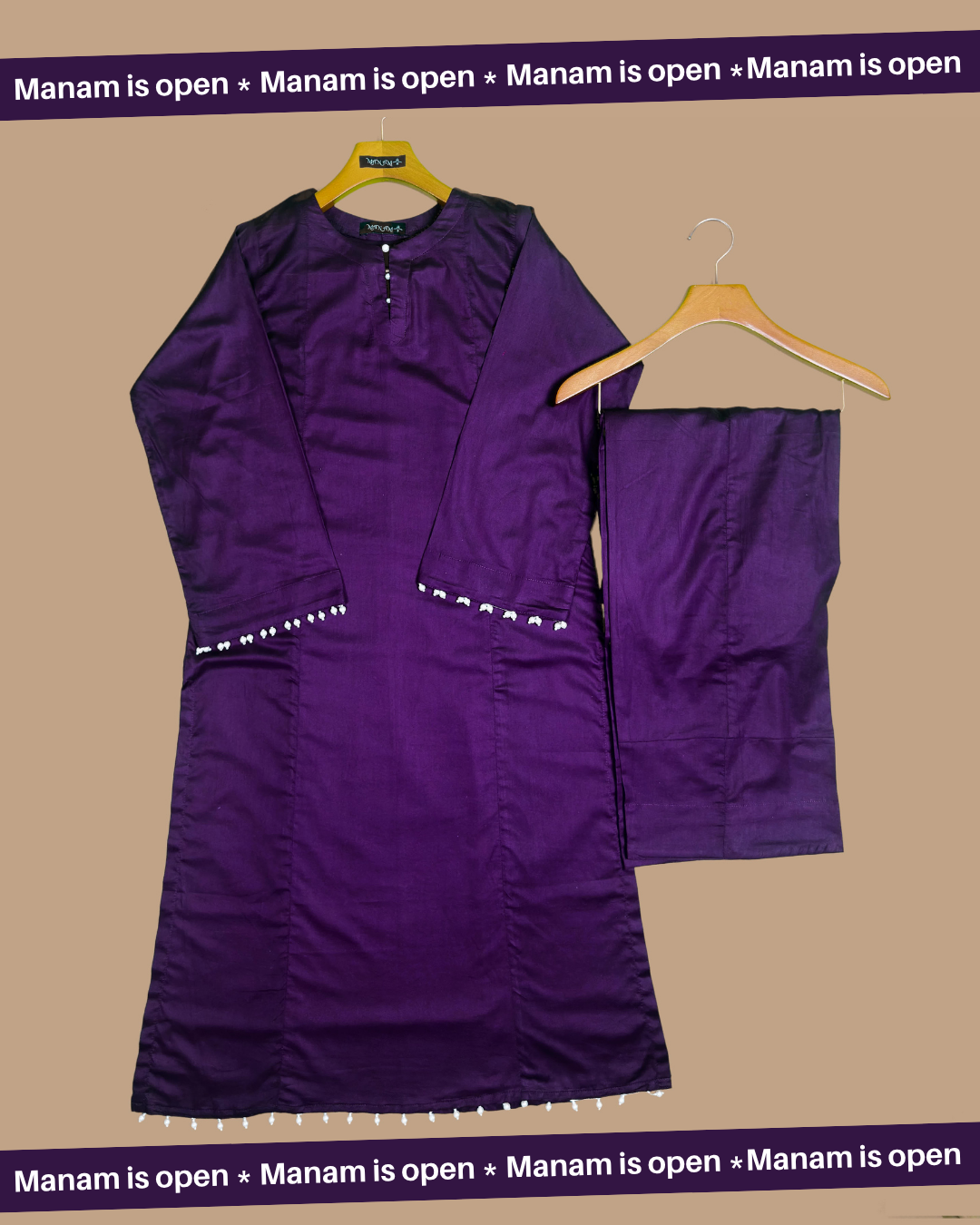 deep plum casual dress for women outfit  hangers against a beige background.