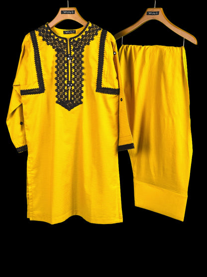 display new summer collection best dresses yellow lace embroidered kurta with matching farshi shalwar on hangers against a black background