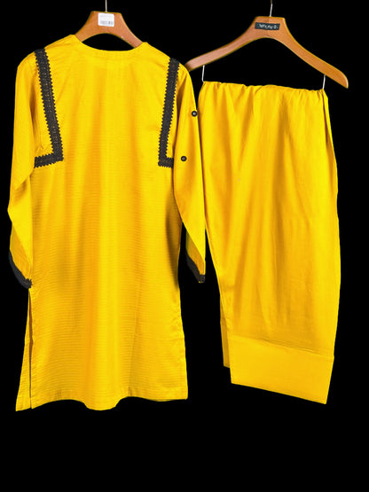 showing new summer collection dresses Yellow kurta with black lace work on kurta backside with farshi shalwar on a hanger