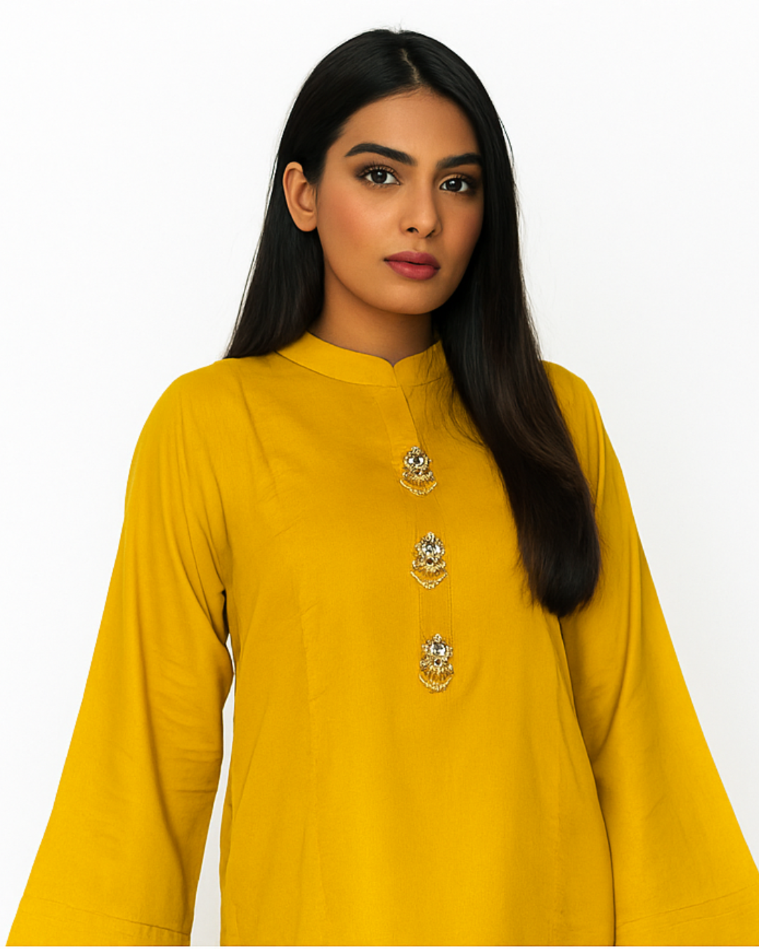 Woman wearing a yellow marzipan ready made dresses for ladies with fancy button on neck by Manam