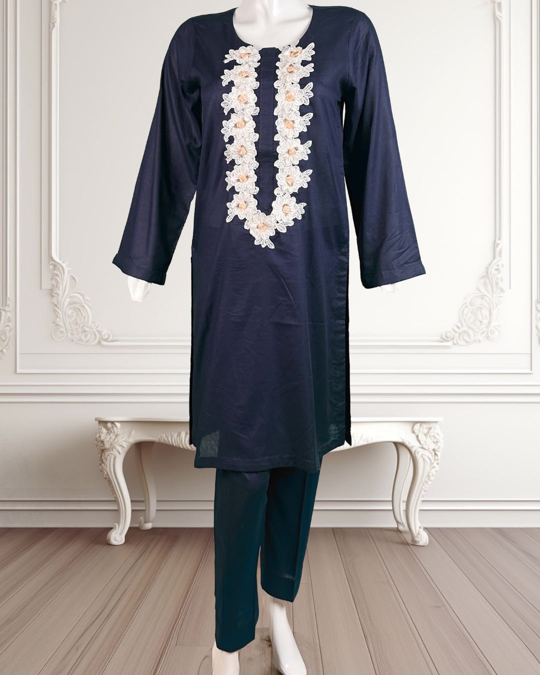 showing women clothing Navy blue kurta with white floral embroidery lace on neck design 